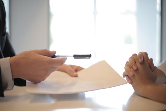 pexels-olly-3760067 tenant-signing-a-document